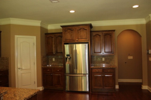 163 Gregory Road Forsyth, GA 31029 - Photo 7 of 20 a room with wooden floor and wardrobe