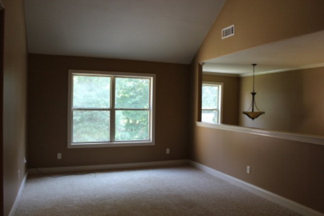 163 Gregory Road Forsyth, GA 31029 - Photo 10 of 20 an empty room with a window