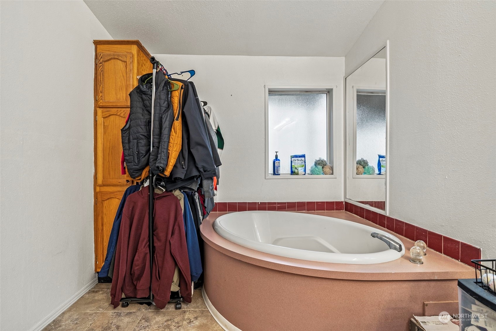 144 Shiloh Road Winlock, WA 98596 - Photo 5 of 37 a view of walk in closet with clothes and shoes