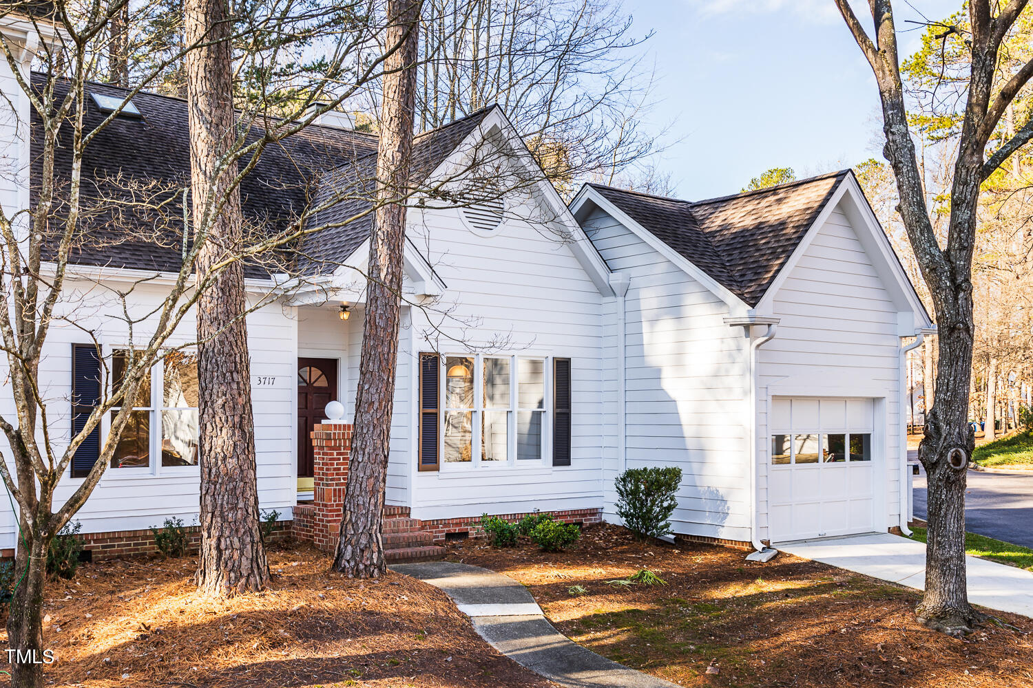 3717 Carnegie Lane Raleigh, NC 27612 - Photo 2 of 28 a view of a house with snow on the road