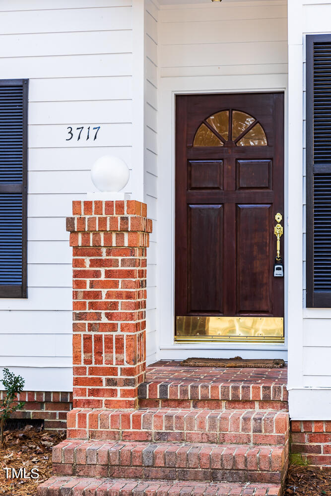 3717 Carnegie Lane Raleigh, NC 27612 - Photo 3 of 28 a view of a door and a window