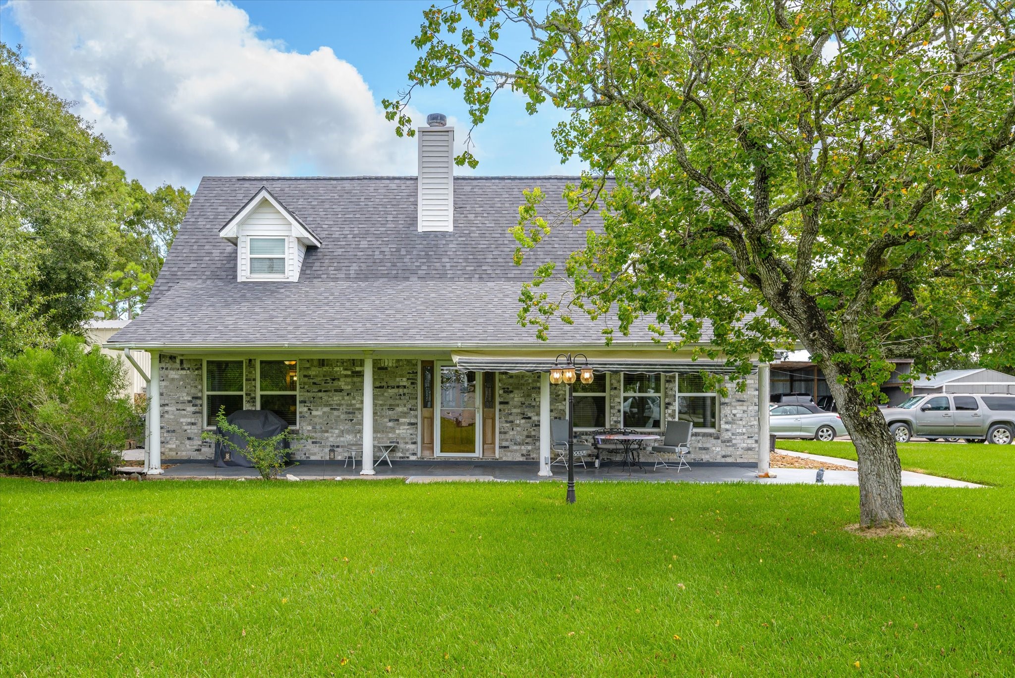 2739 Lawrence Road Kemah, TX 77565 - Photo 1 of 42 front view of a house with a yard
