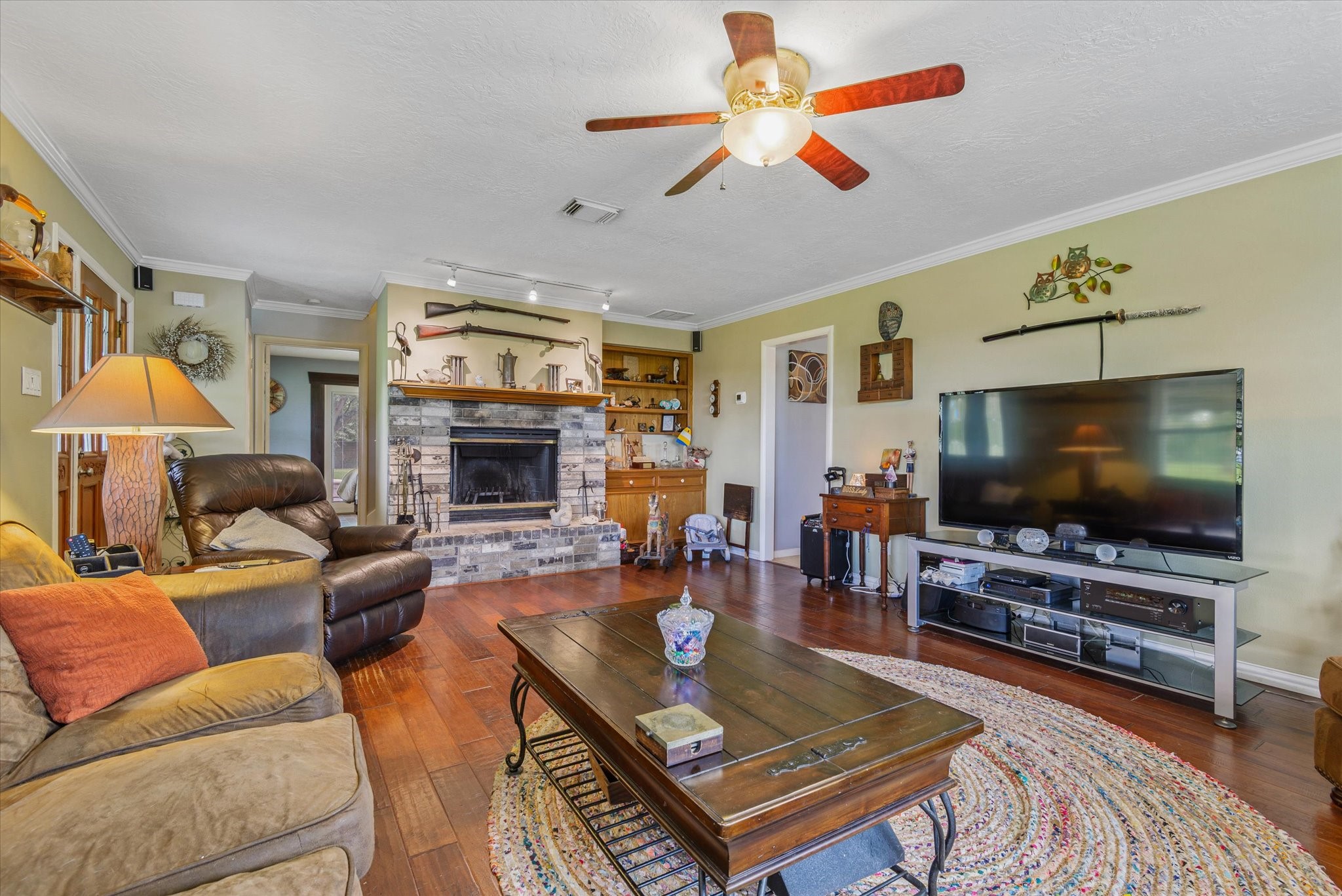 2739 Lawrence Road Kemah, TX 77565 - Photo 15 of 42 a living room with furniture and a flat screen tv