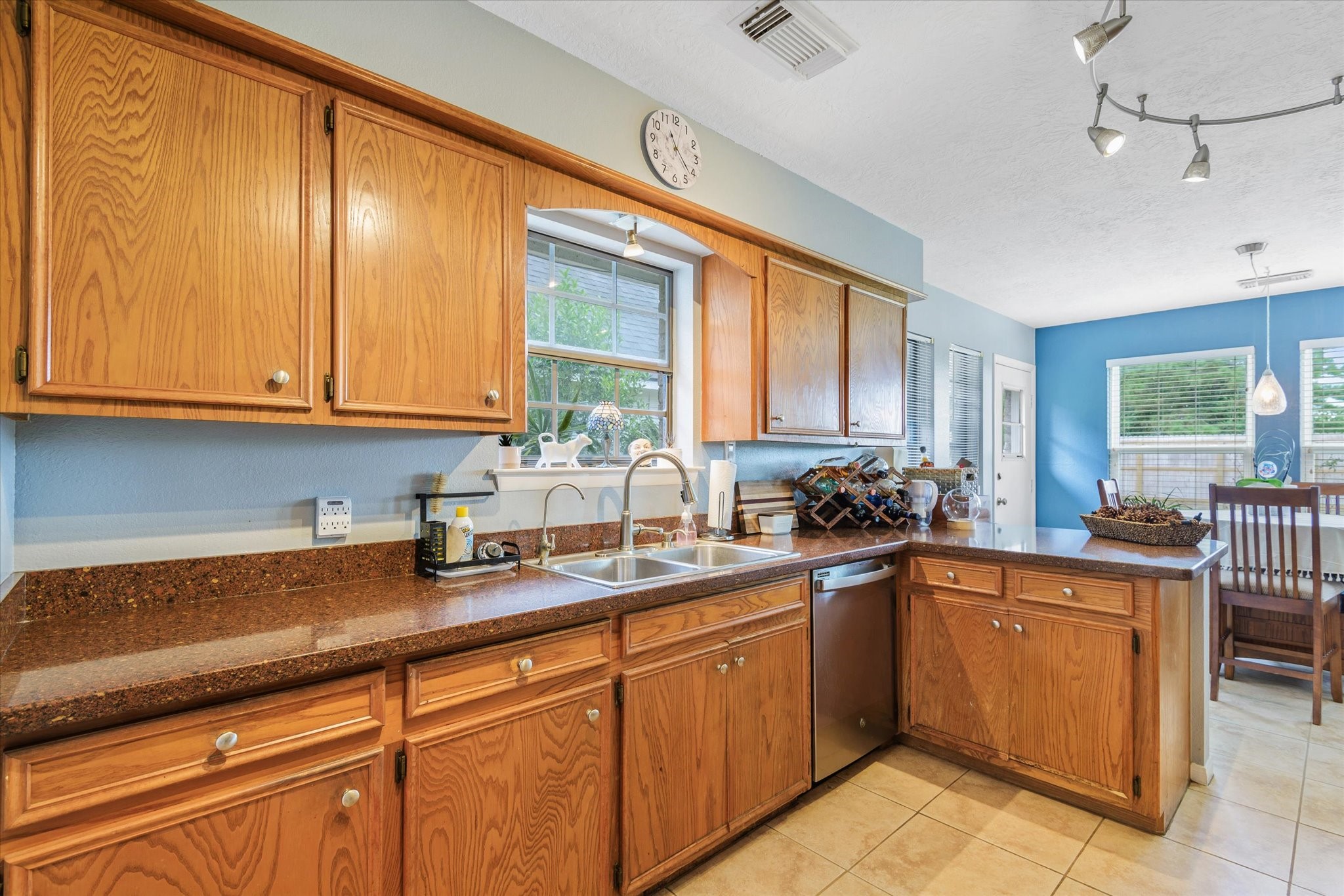 2739 Lawrence Road Kemah, TX 77565 - Photo 19 of 42 a kitchen with lots of counter space and wooden floor