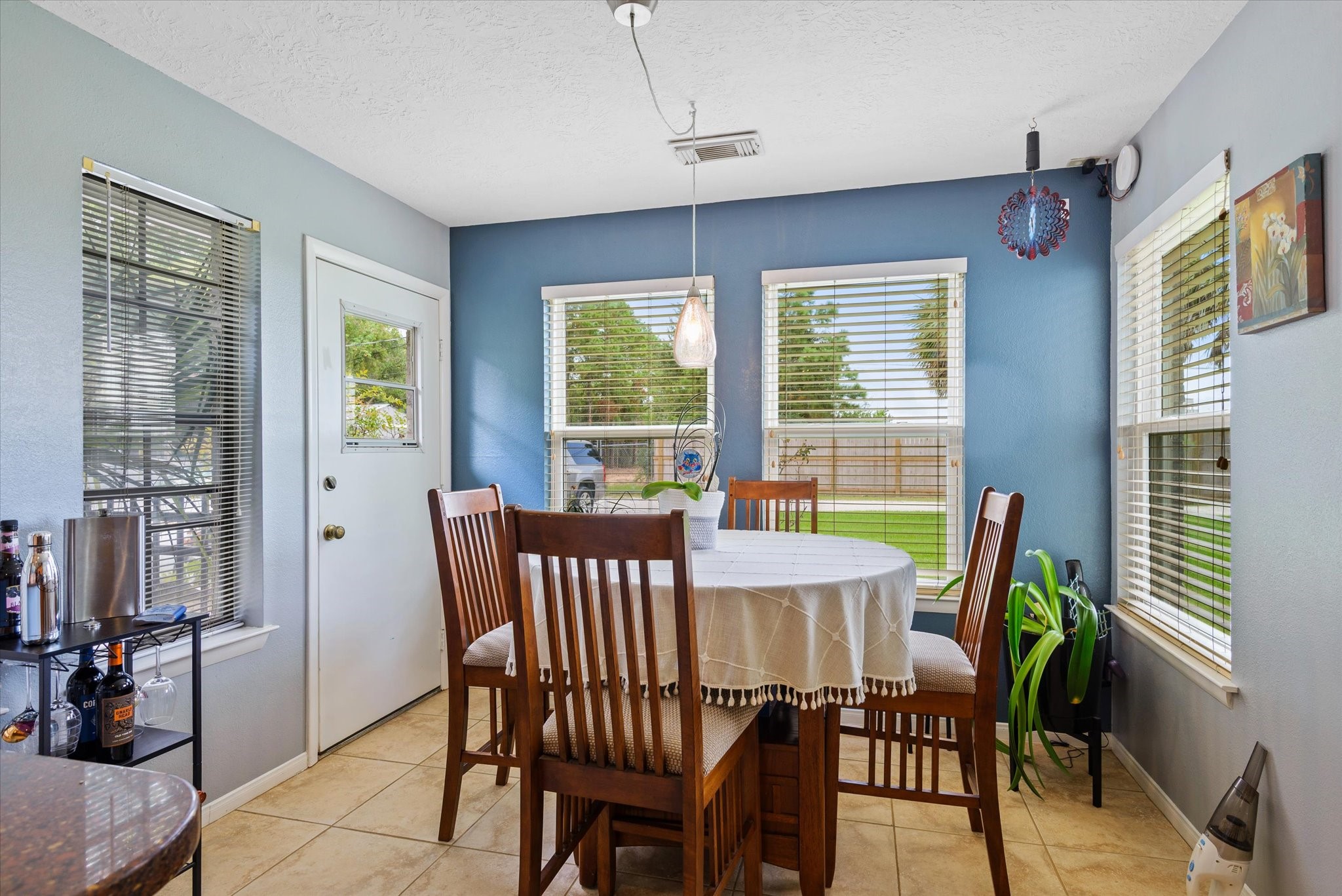 2739 Lawrence Road Kemah, TX 77565 - Photo 21 of 42 a view of a dining room with furniture window and outside view
