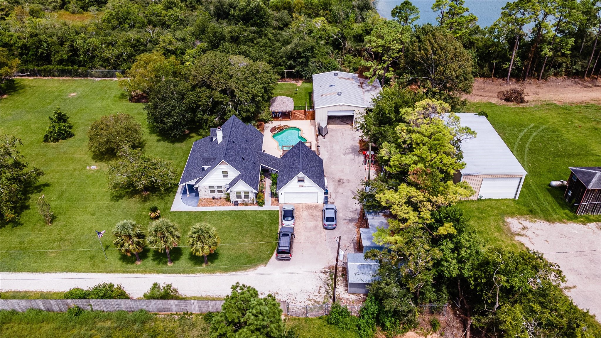 2739 Lawrence Road Kemah, TX 77565 - Photo 3 of 42 an aerial view of residential house with outdoor space and swimming pool
