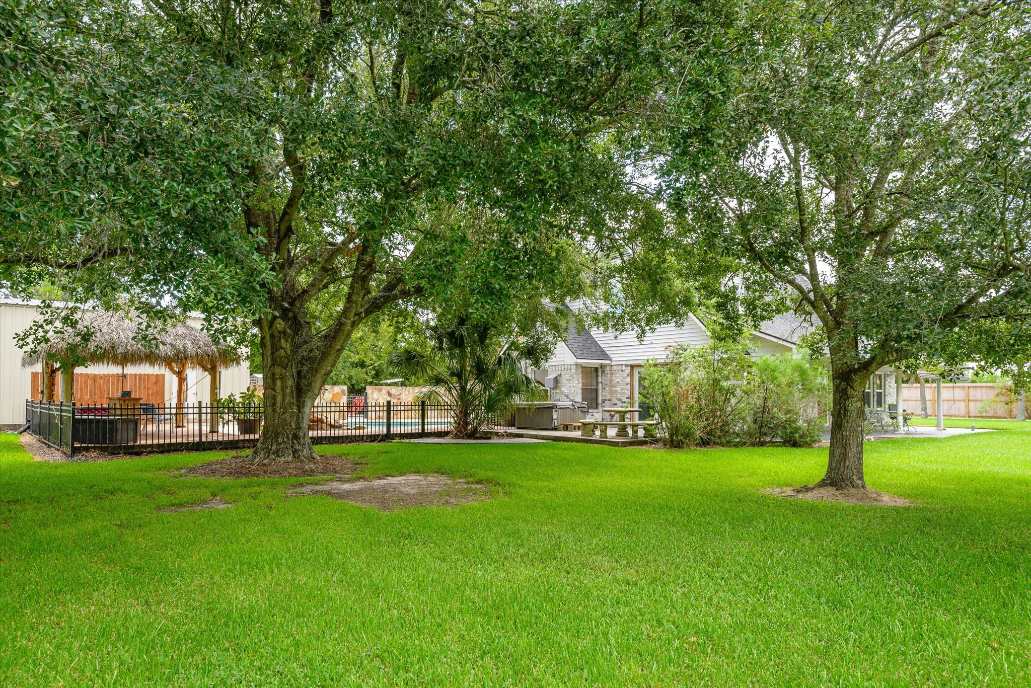 2739 Lawrence Road Kemah, TX 77565 - Photo 35 of 42 a garden view with trees
