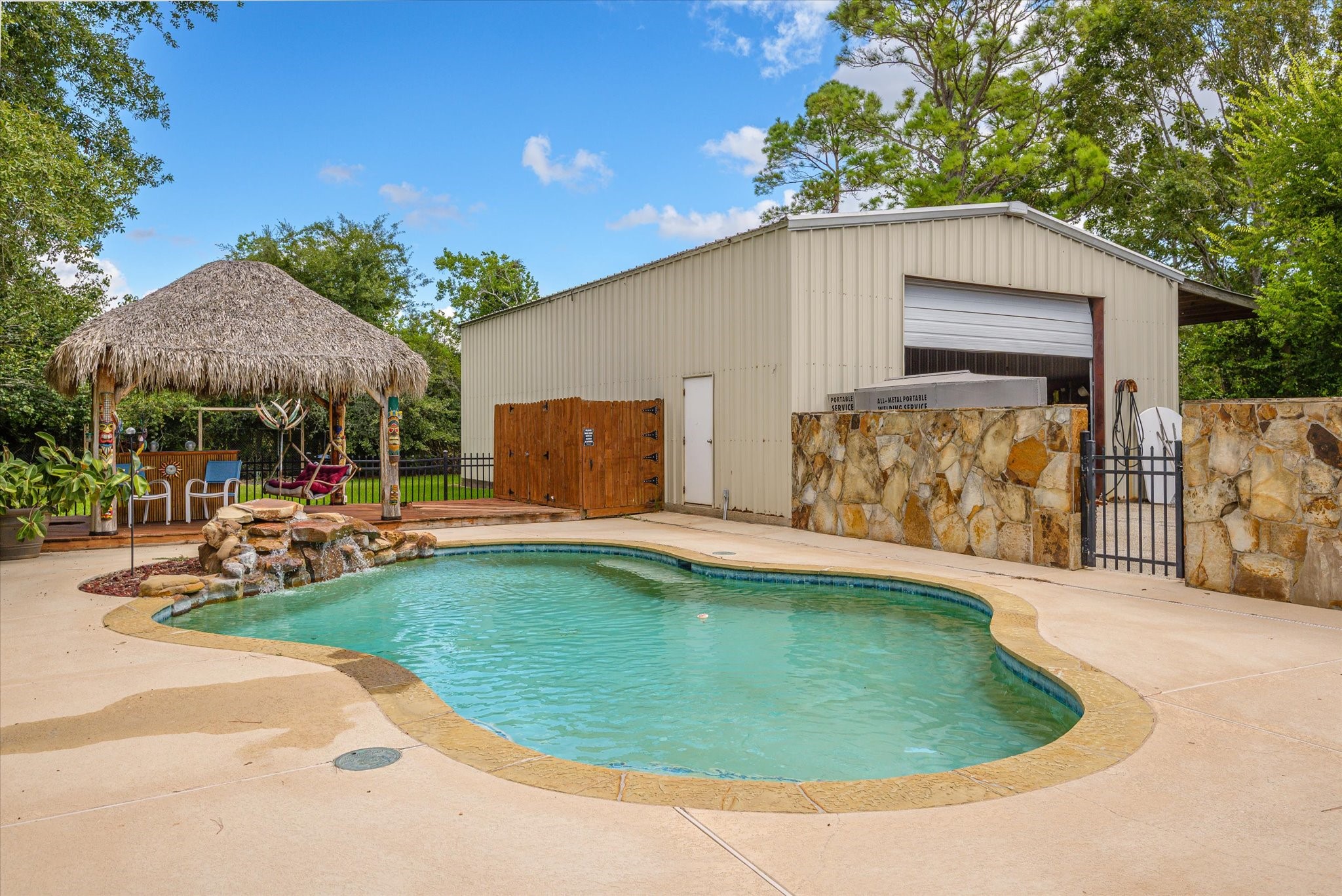 2739 Lawrence Road Kemah, TX 77565 - Photo 8 of 42 a view of a swimming pool with a patio