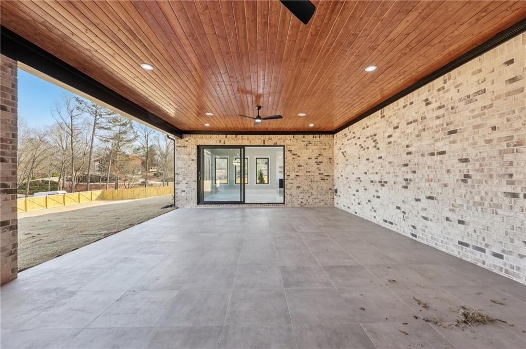 1556 Ewing Chapel Road Dacula, GA 30019 - Photo 59 of 67 a view of an empty room with a fireplace