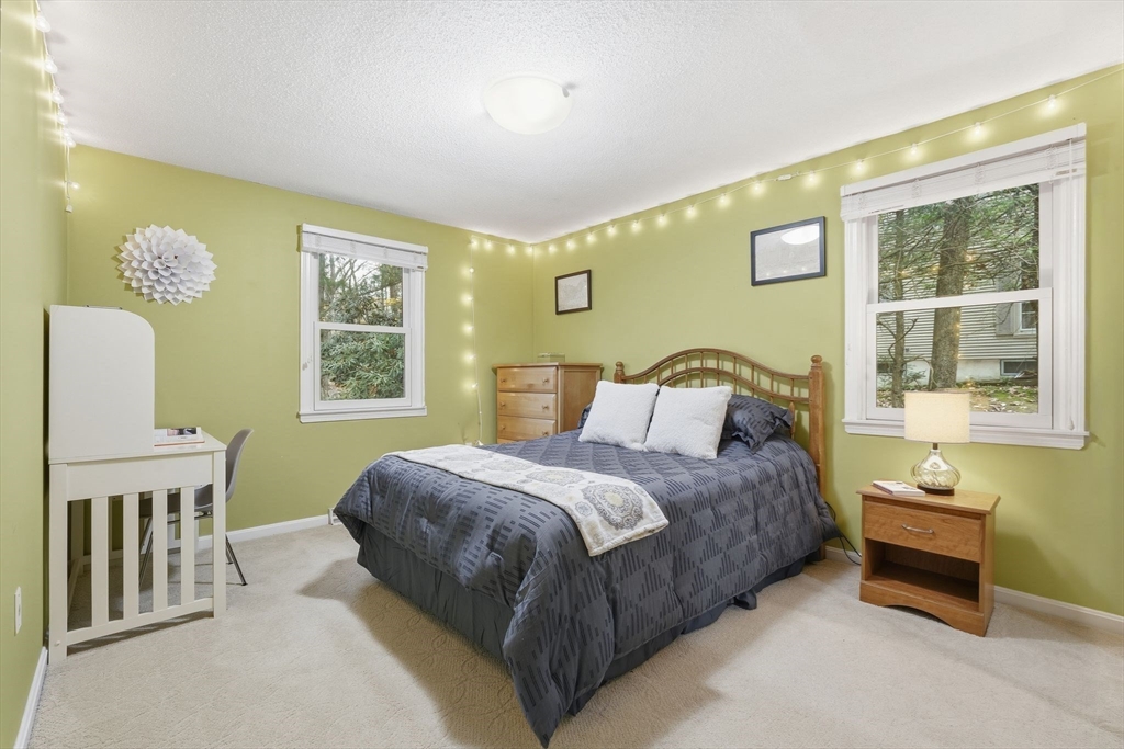 47 Academy Drive Longmeadow, MA 01106 - Photo 33 of 42 a bedroom with a bed dresser and a window