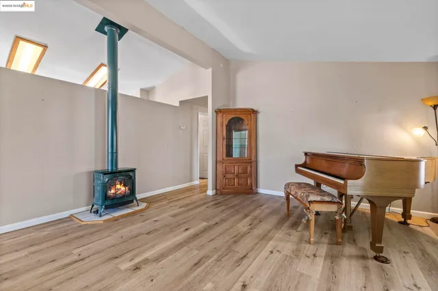 a view of a livingroom with furniture and wooden floor