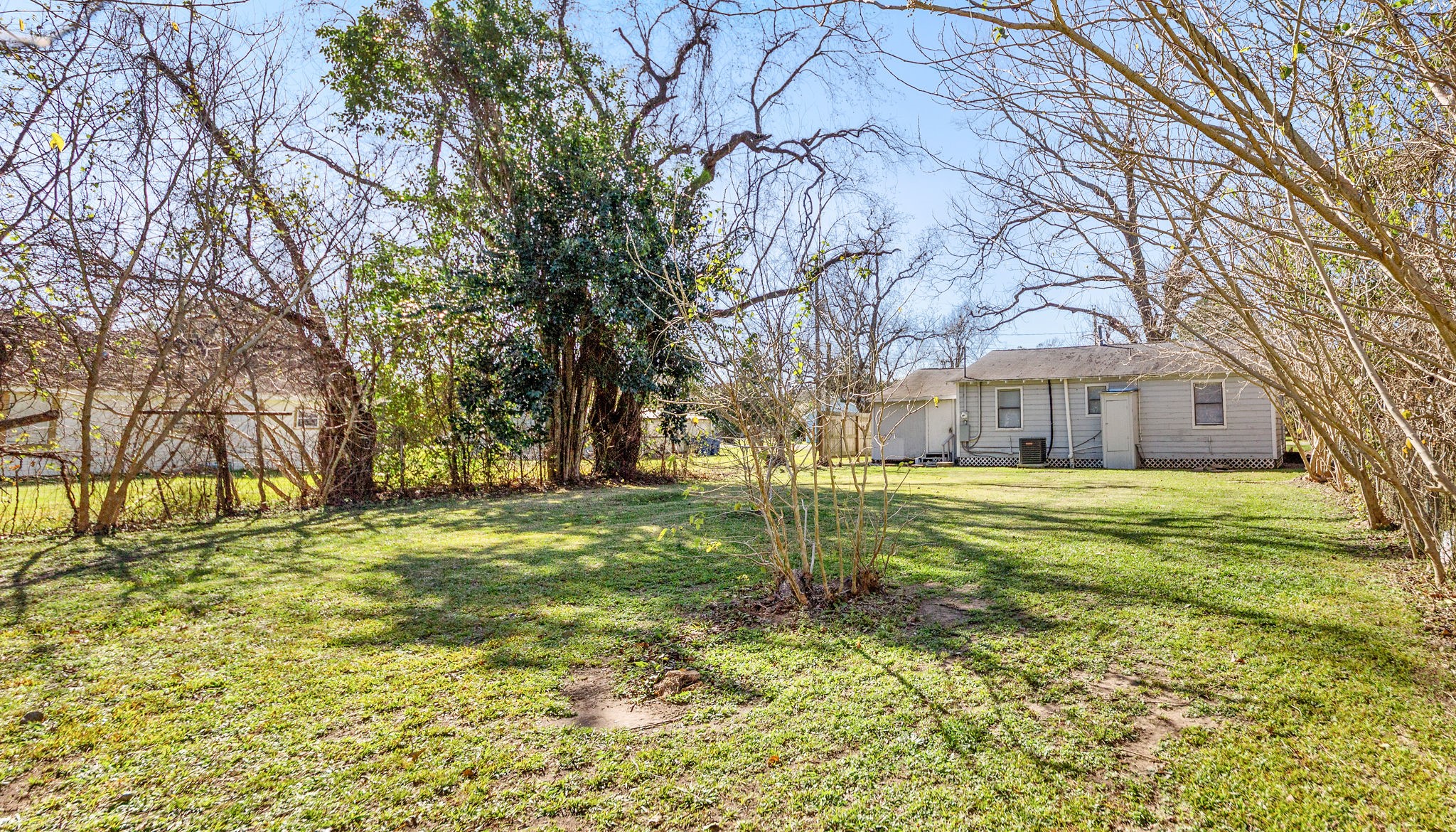 203 South Fig Street Sweeny, TX 77480 - Photo 20 of 20 a view of a yard with a house
