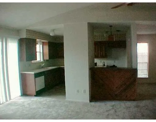 a view of cabinets and a sink