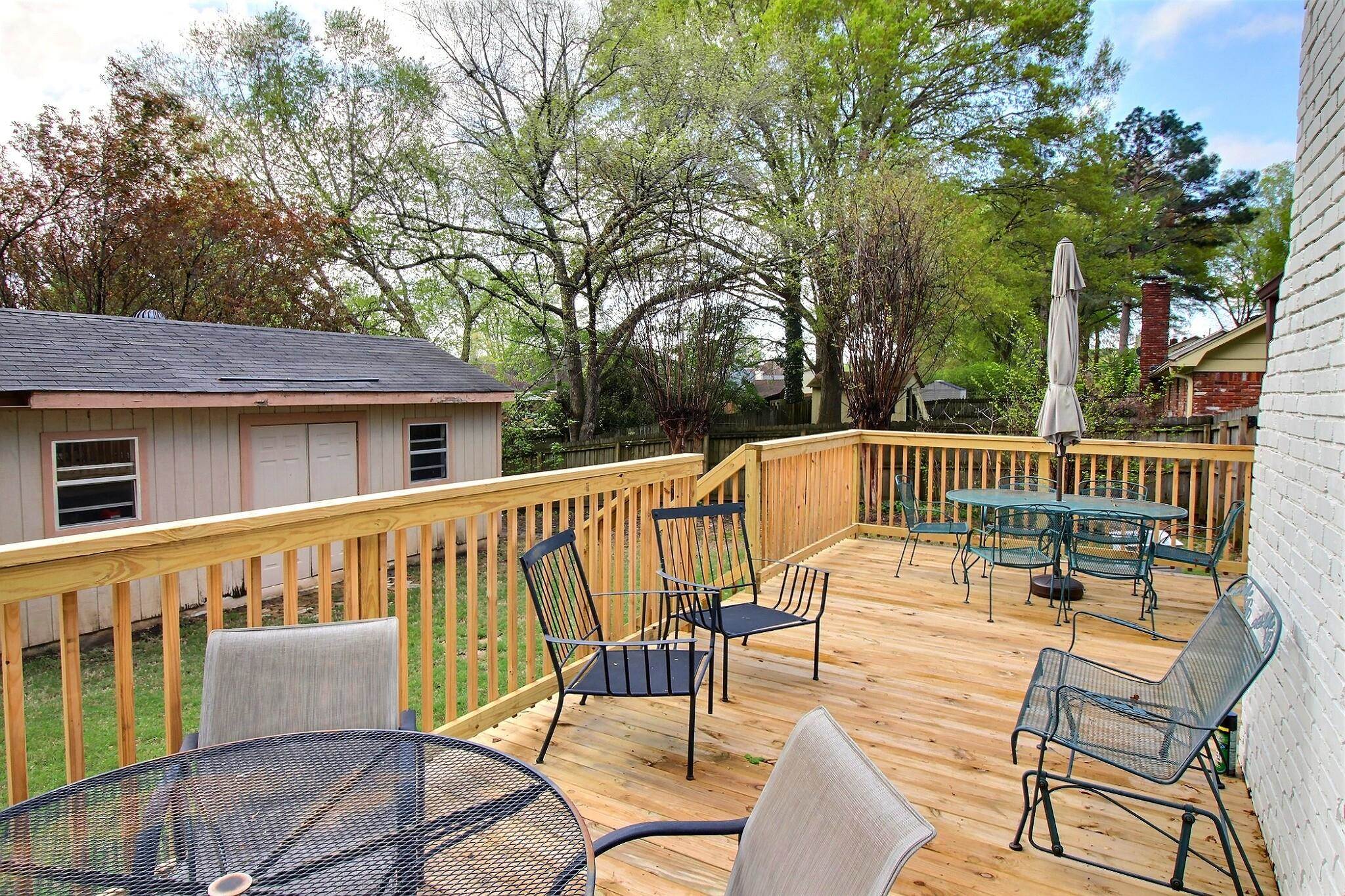 348 Rutledge Street Collierville, TN 38017 - Photo 18 of 19 a view of a chair and tables on the roof deck