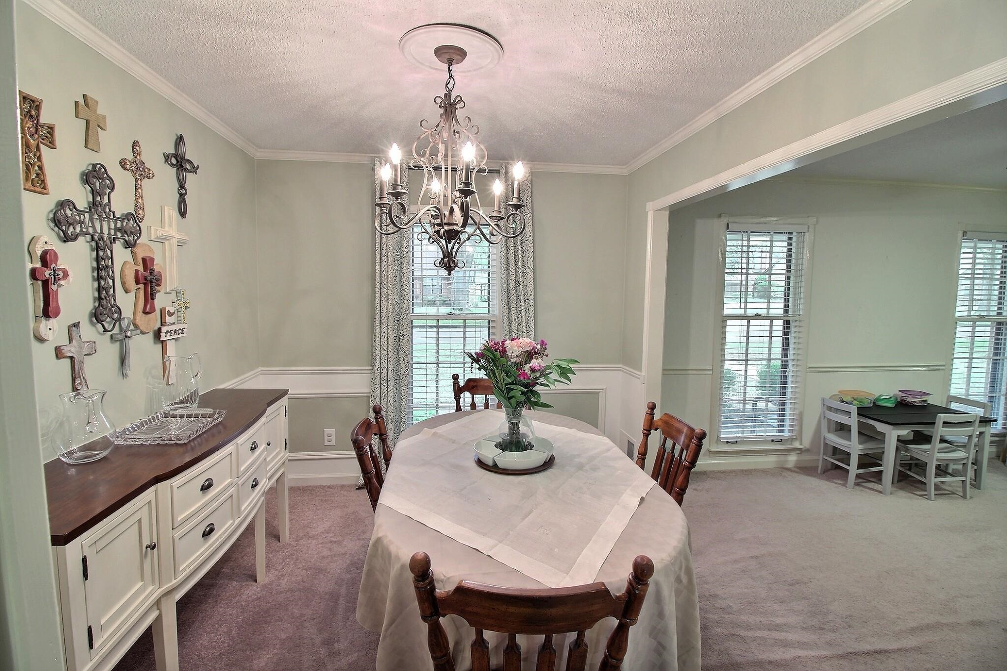 348 Rutledge Street Collierville, TN 38017 - Photo 6 of 19 a view of a dining room with furniture window and outside view