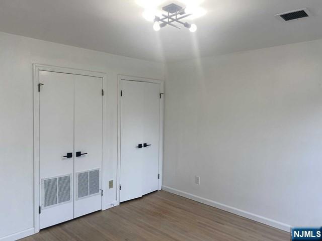 19-23 East Main Street, Unit B Ramsey, NJ 07446 - Photo 17 of 21 a view of a room with wooden floor