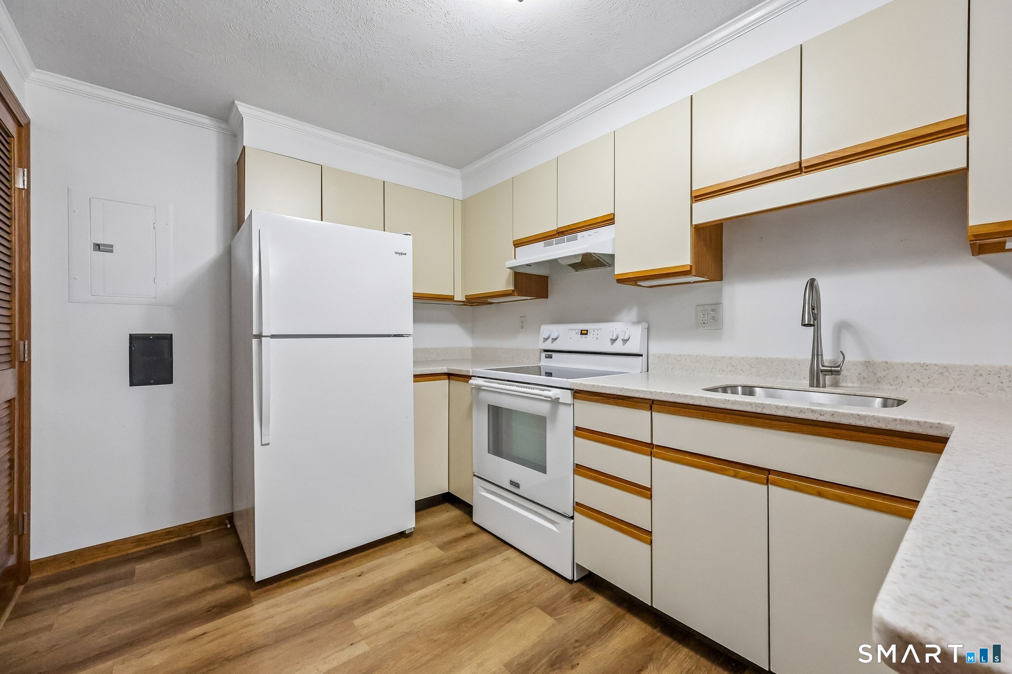 65 Old Route 79, Unit 5 Madison, CT 06443 - Photo 11 of 28 Easy care Corian counters and lots of cabinetry