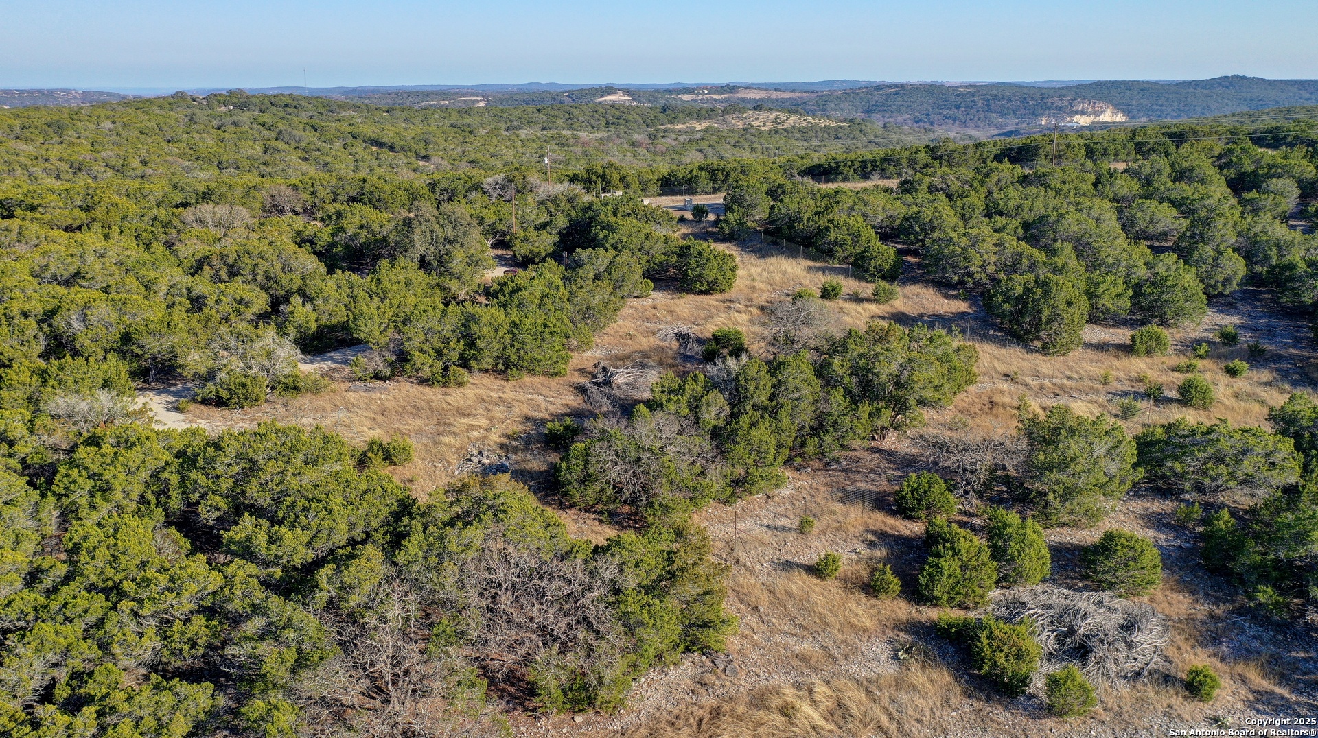 0 River Bend Road West Hunt, TX 78024 - Photo 2 of 55 a view of a forest with a street