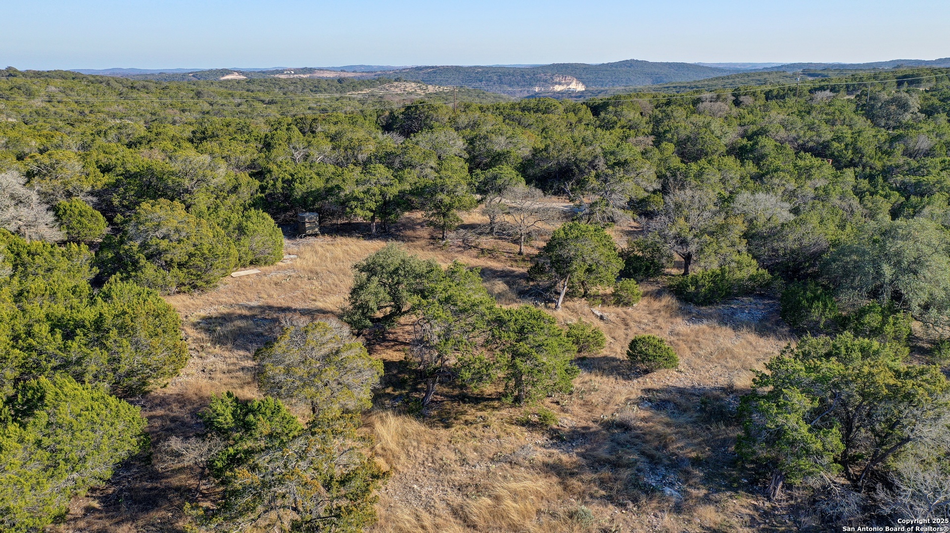 0 River Bend Road West Hunt, TX 78024 - Photo 8 of 55 a view of a lush green forest with trees and houses
