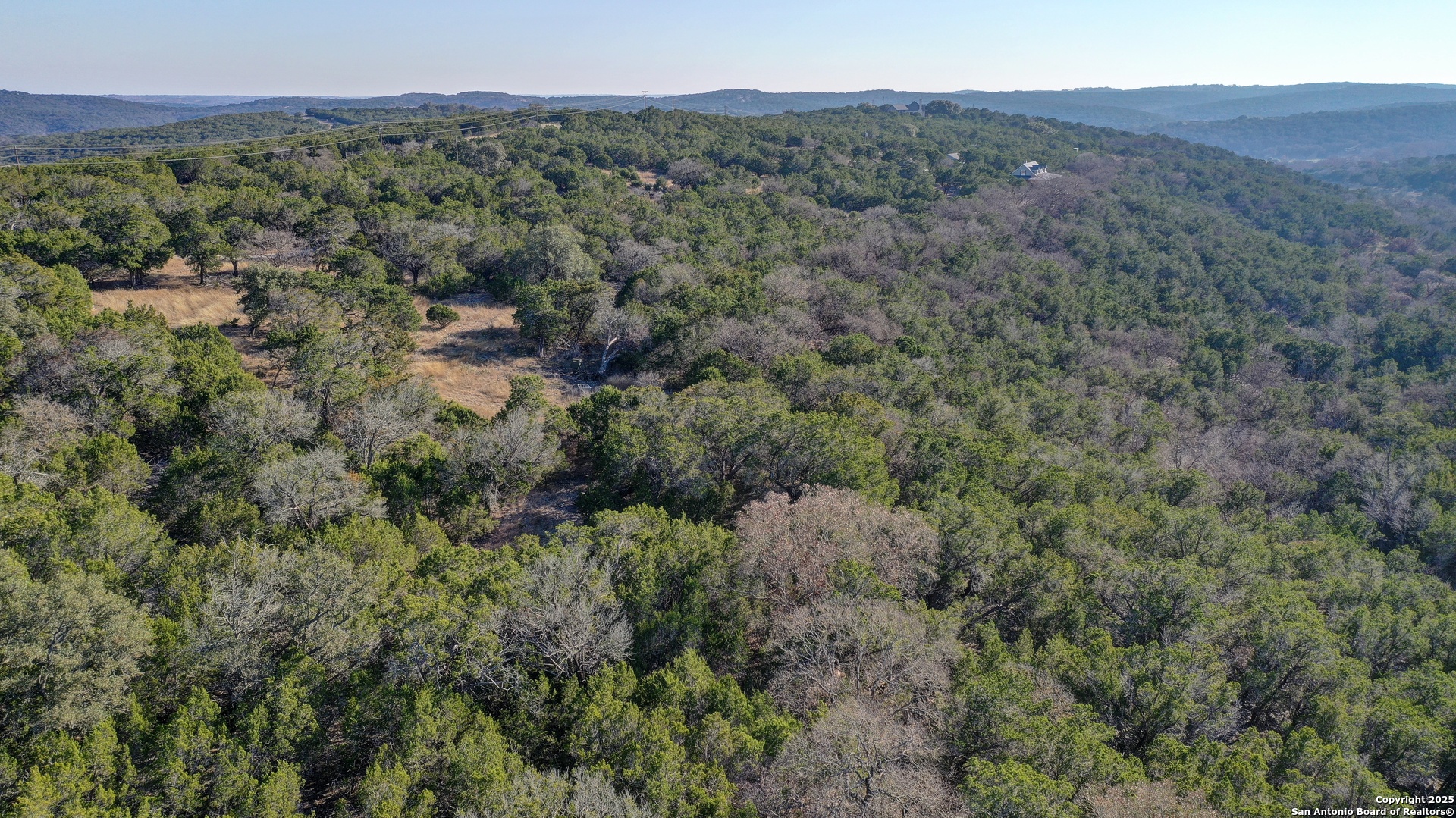 0 River Bend Road West Hunt, TX 78024 - Photo 9 of 55 a view of a city with lush green forest
