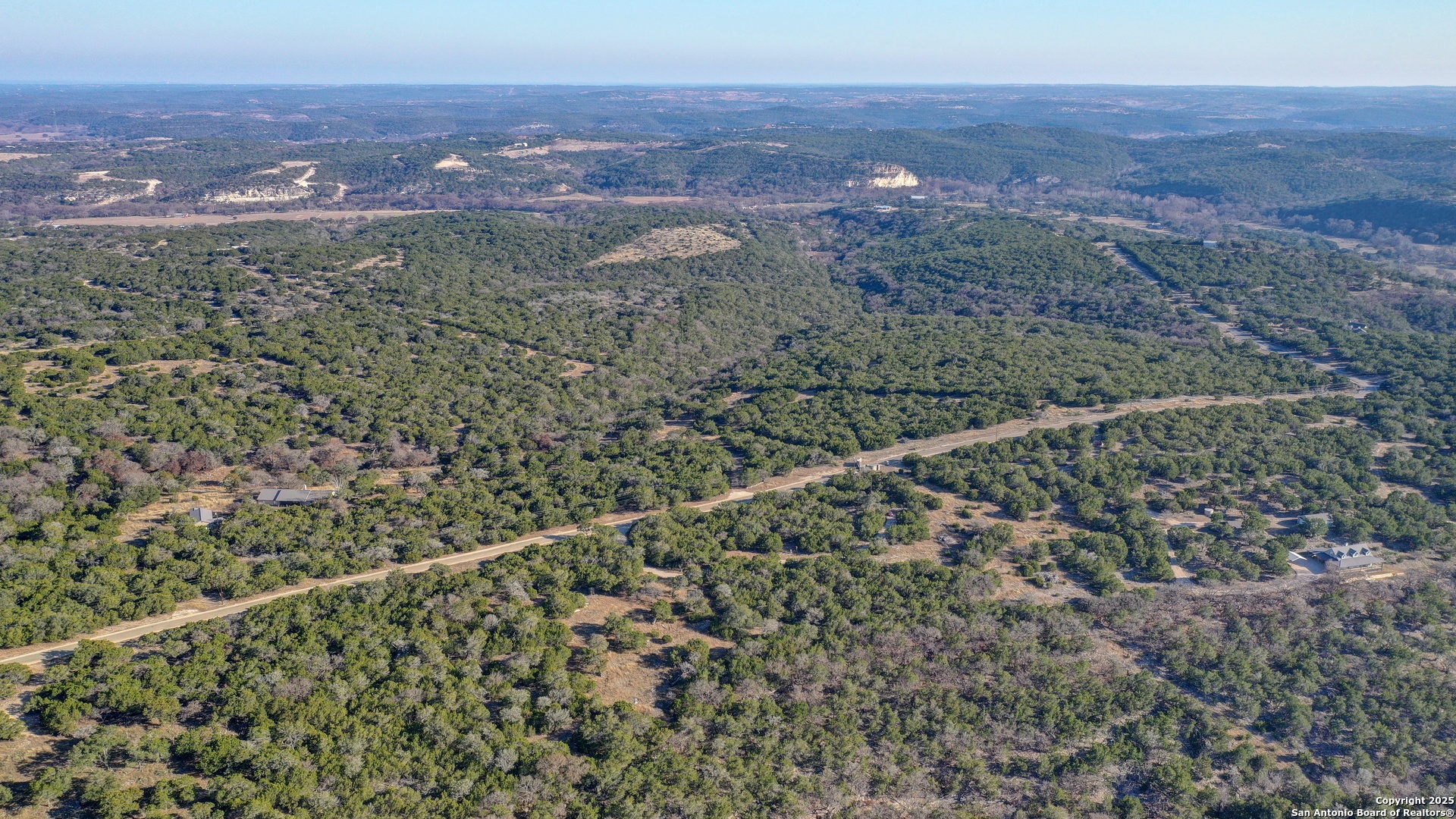 0 River Bend Road West Hunt, TX 78024 - Photo 10 of 55 a view of a city with lush green forest