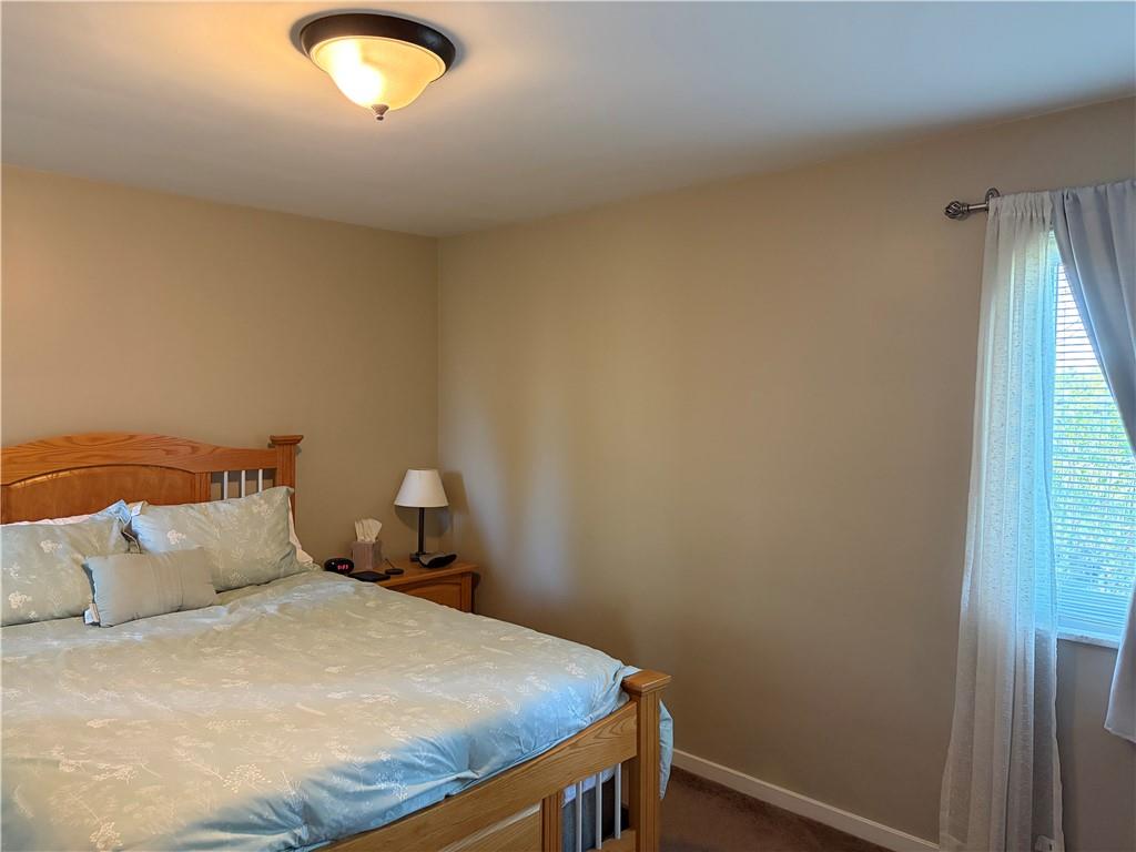 359 Dorseyville Road Pittsburgh, PA 15215 - Photo 19 of 29 a bedroom with a bed and a window