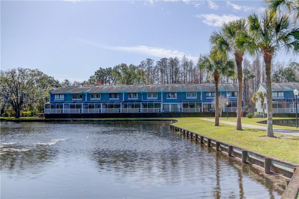 1825 Mazo Manor Road, Unit V8 Lutz, FL 33558 - Photo 1 of 1 Peaceful and lovely. Unit is 3rd from the right.