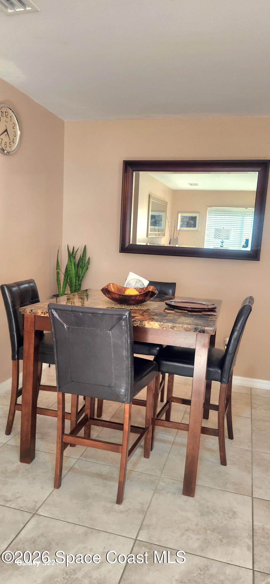 1327 Cherry Hills Road Northeast Palm Bay, FL 32905 - Photo 13 of 20 1327 cherry hills dining rm