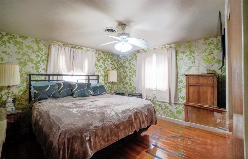 53 Yale Road Needham, MA 02494 - Photo 11 of 21 a bedroom with a bed and a large window
