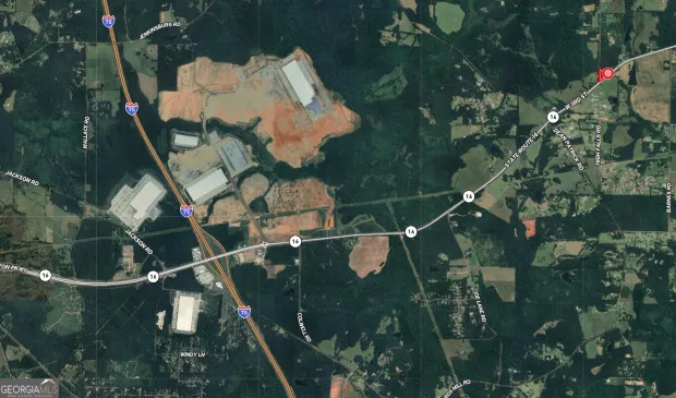 a view of a wooden house and a tree park