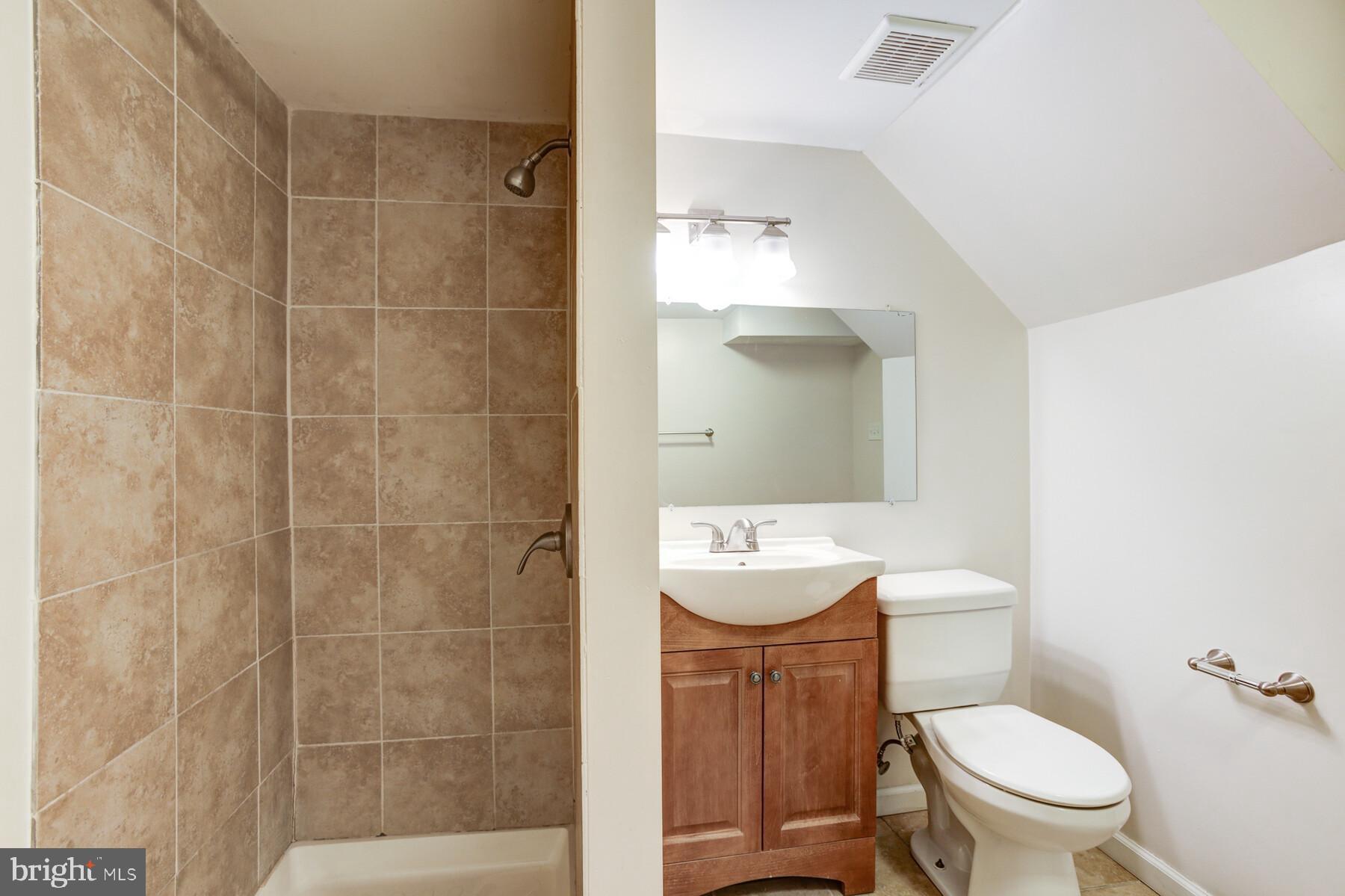 339 Grovethorn Road Baltimore, MD 21220 - Photo 31 of 37 Full bathroom with shower in the basement.
