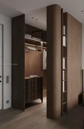 a bathroom with a shower and a sink