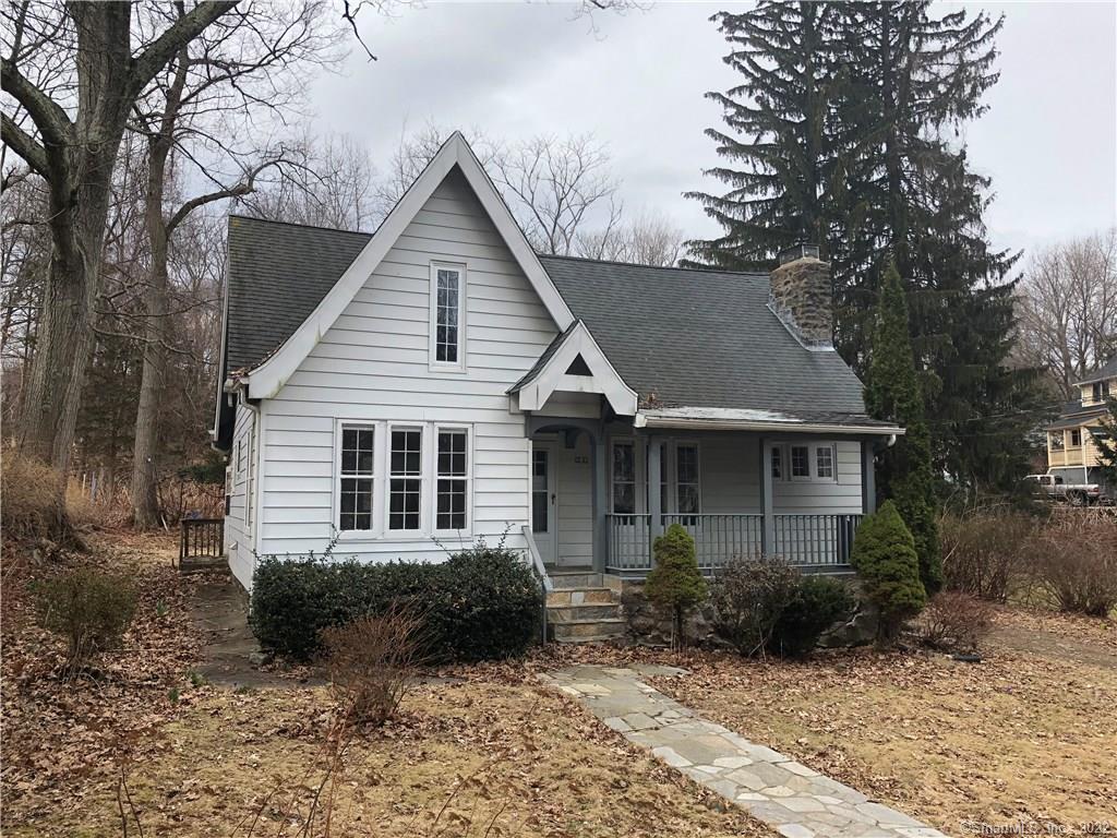 51 Springdale Avenue Waterbury, CT 06708 - Photo 1 of 1 a view of a house with a yard and large trees