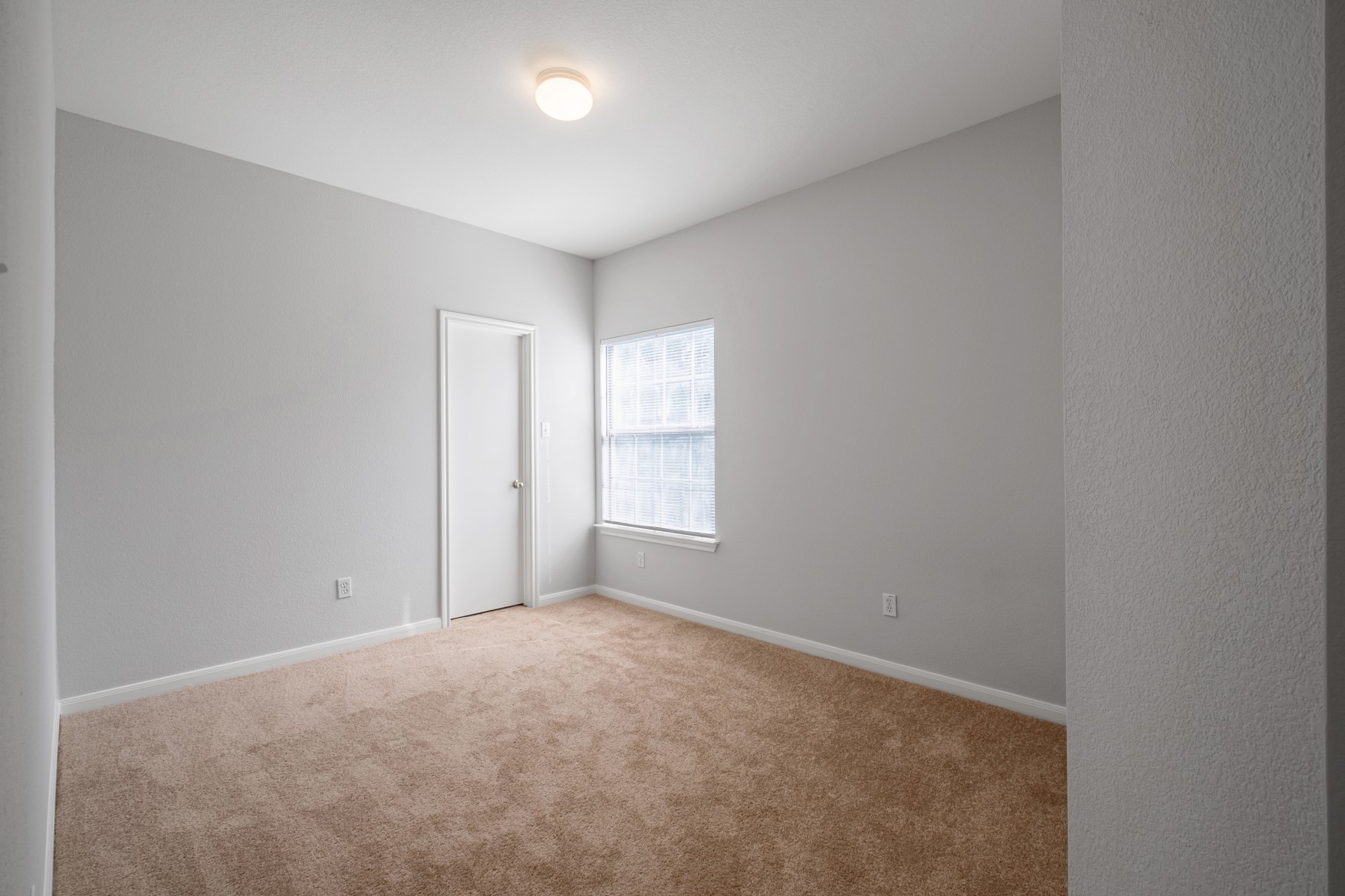2300 South Bagdad Road, Unit B Leander, TX 78641 - Photo 11 of 20 a view of an empty room with a window