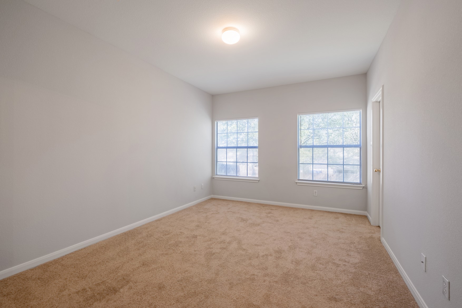 2300 South Bagdad Road, Unit B Leander, TX 78641 - Photo 13 of 20 an empty room with windows