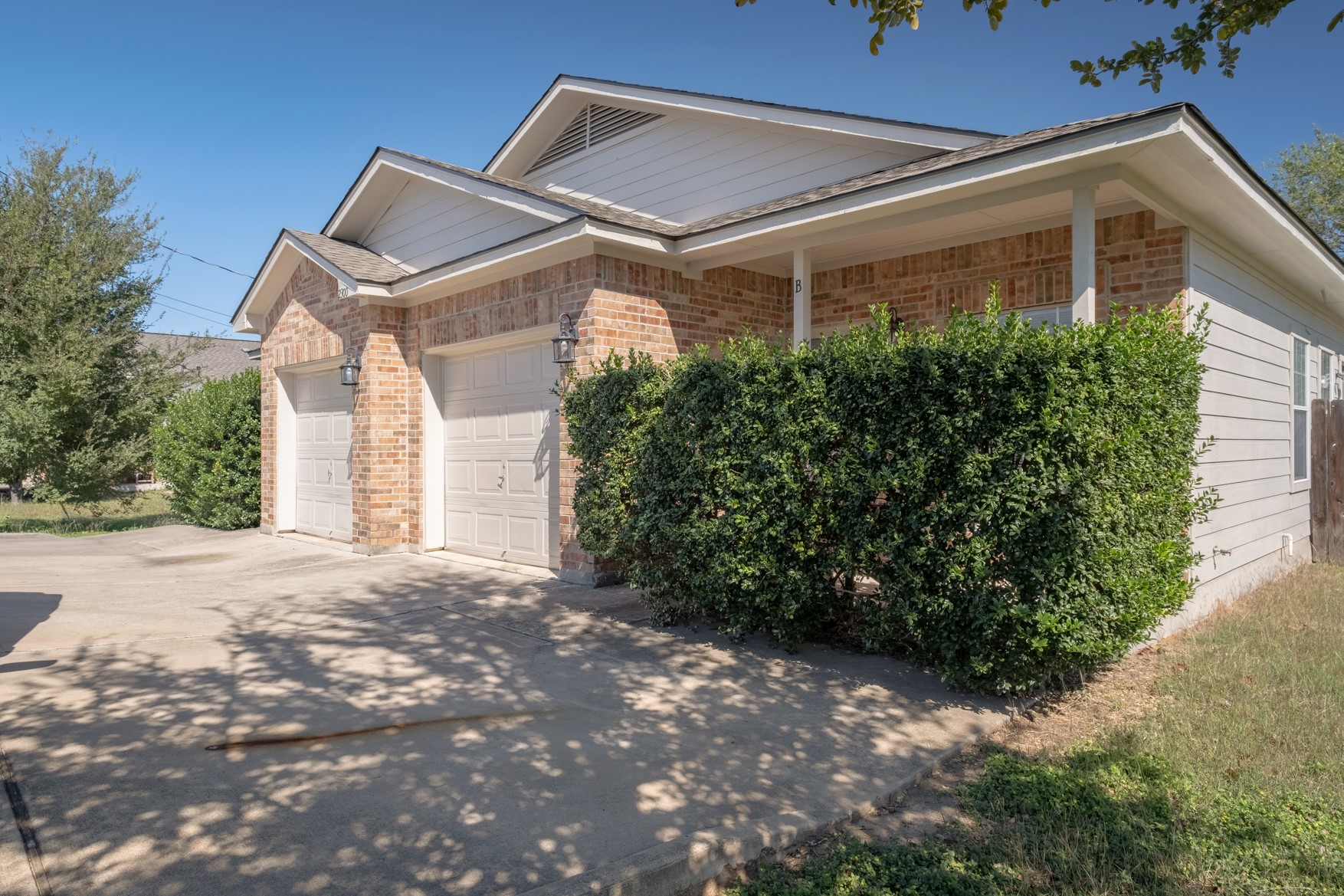 2300 South Bagdad Road, Unit B Leander, TX 78641 - Photo 19 of 20 a view of a house with a yard