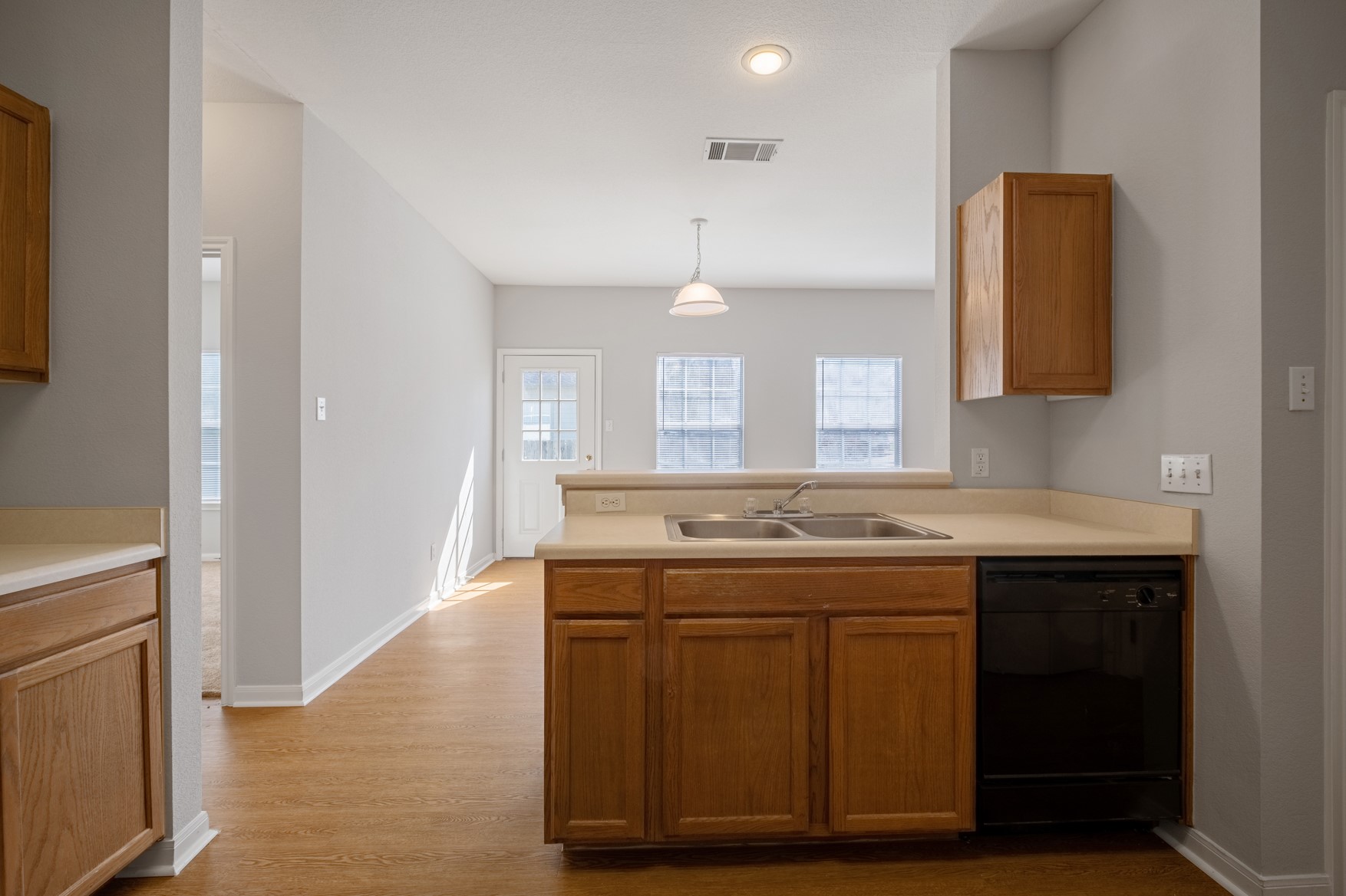 2300 South Bagdad Road, Unit B Leander, TX 78641 - Photo 8 of 20 a bathroom with a sink and a mirror
