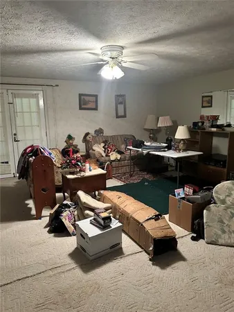 a room with furniture and gym equipment
