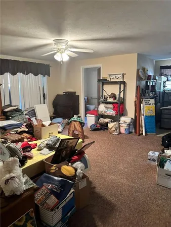 a bedroom with furniture and a gym equipment