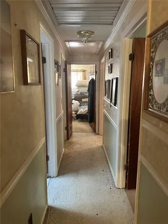 a view of hallway with washer and dryer