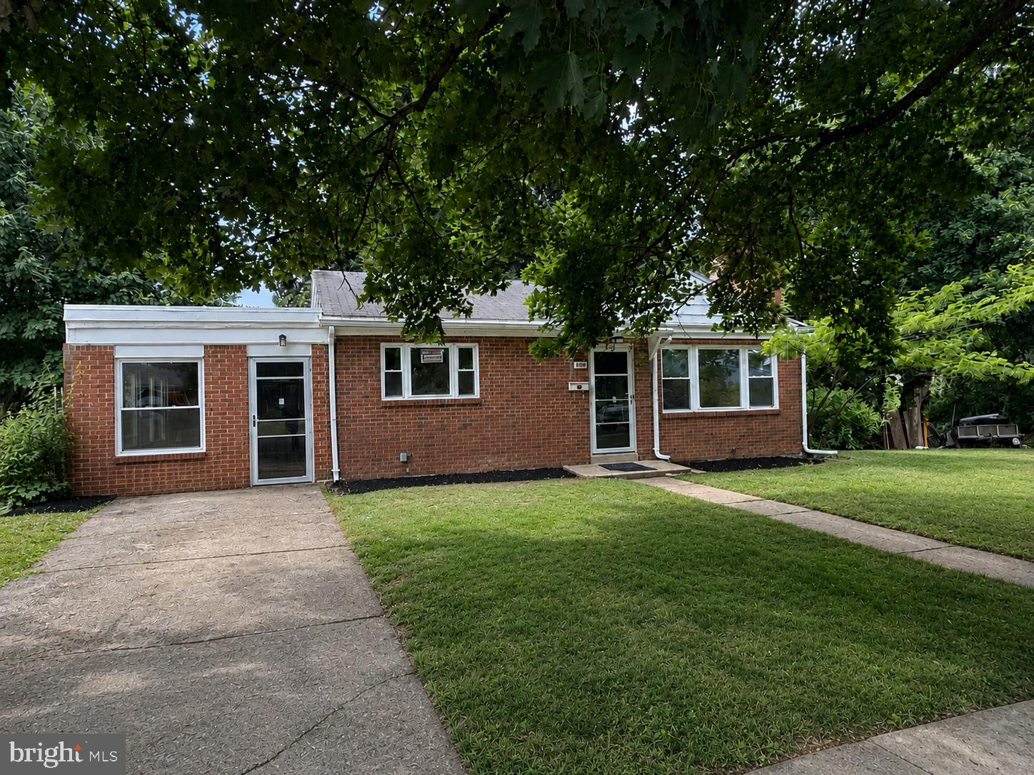 408 Clinton Road Harrisburg, PA 17109 - Photo 5 of 37 a front view of a house with a garden