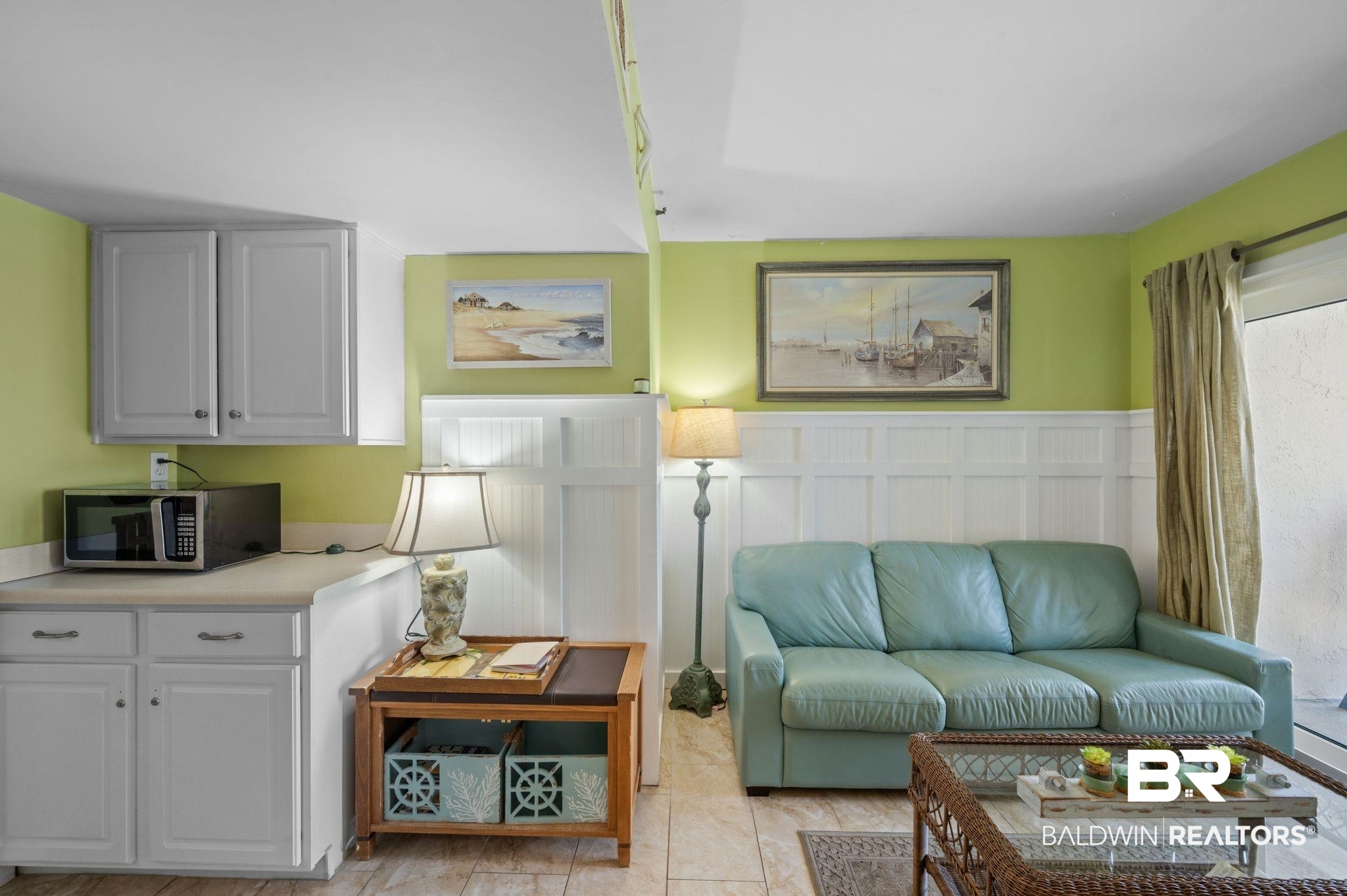 375 Plantation Road, Unit 5304 Gulf Shores, AL 36542 - Photo 8 of 42 Living room with wainscoting and a decorative wall
