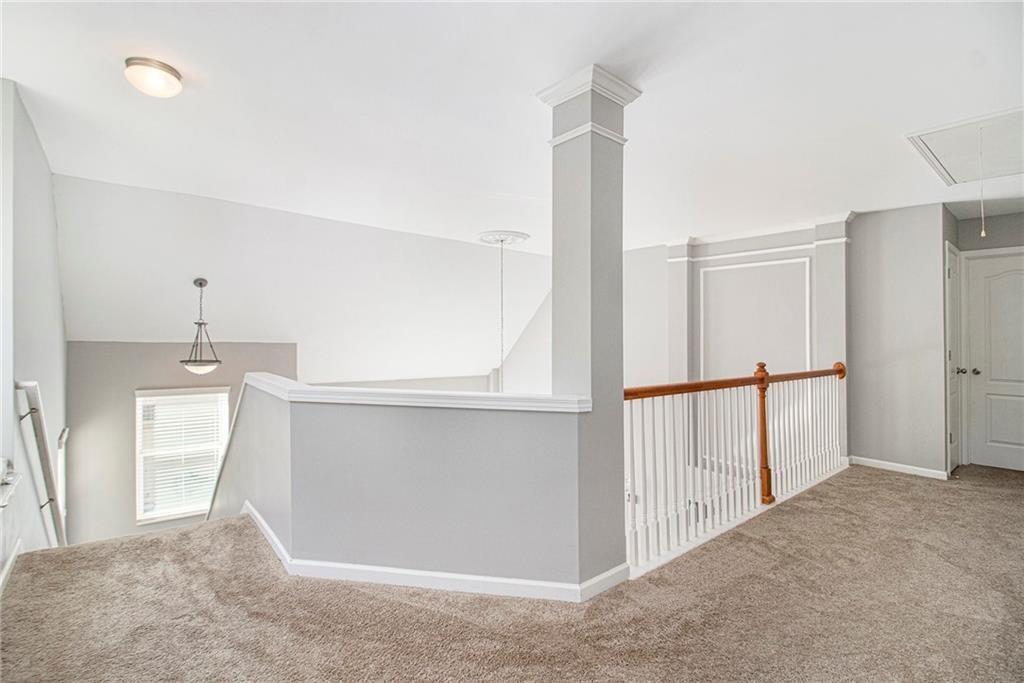 4249 Rosehall Court Atlanta, GA 30349 - Photo 20 of 28 a view of a hallway to an empty room