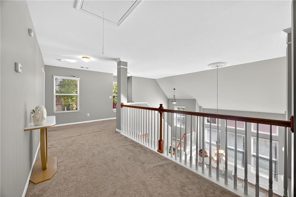 4249 Rosehall Court Atlanta, GA 30349 - Photo 25 of 28 a view of a hallway with workspace