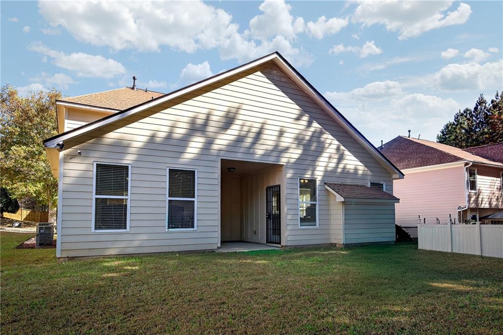 4249 Rosehall Court Atlanta, GA 30349 - Photo 26 of 28 a view of backyard of house