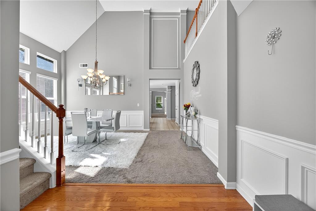 4249 Rosehall Court Atlanta, GA 30349 - Photo 3 of 28 a view of an entryway with wooden floor and a livingroom view