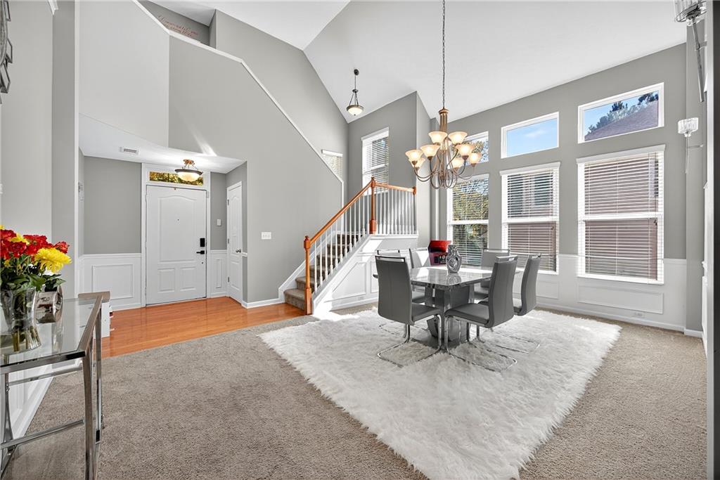 4249 Rosehall Court Atlanta, GA 30349 - Photo 6 of 28 a dining room with furniture and window
