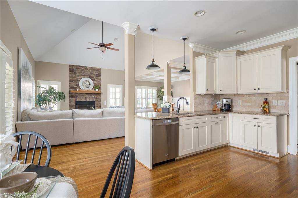 8900 West Pepper Court Oak Ridge, NC 27310 - Photo 19 of 50 Breakfast Nook into the Kitchen