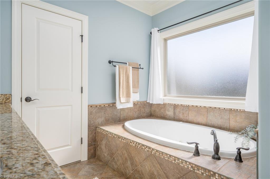 8900 West Pepper Court Oak Ridge, NC 27310 - Photo 27 of 50 Primary Bathroom