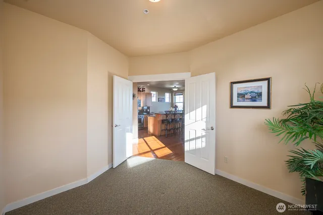 a view of a hallway with workspace